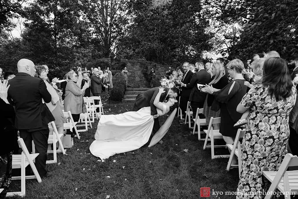 Fall The Inn at Fernbrook Farm Chesterfield NJ Wedding ceremony groom dips his new wife a kiss