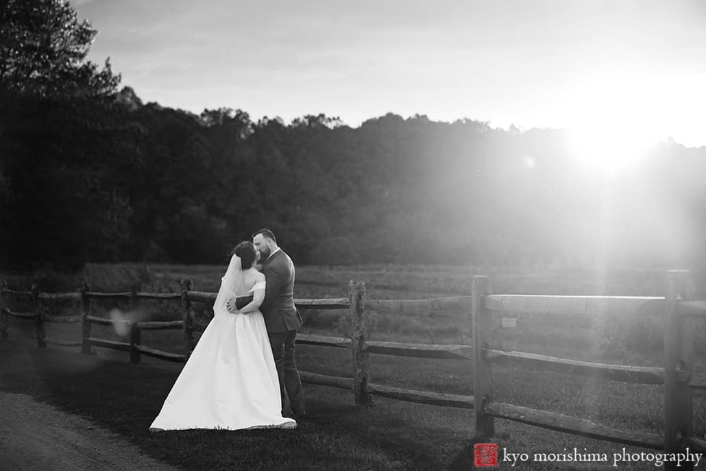 Fall The Inn at Fernbrook Farm Chesterfield NJ Wedding bride and groom outdoor sunset portrait picture by fence black and white