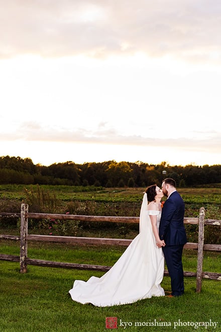 Fall The Inn at Fernbrook Farm Chesterfield NJ Wedding bride and groom outdoor sunset portrait picture by fence