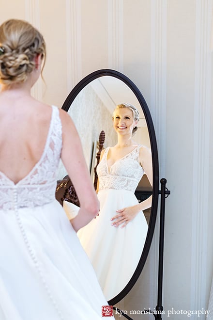 Nassau Inn Princeton NJ wedding bride smiling at her self on mirror getting ready