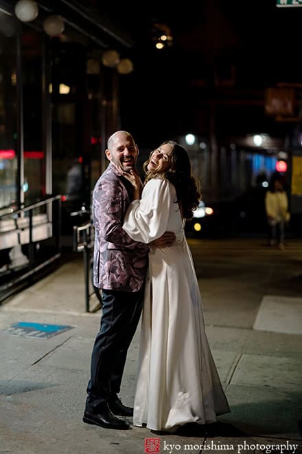 bride and groom outdoor street fun romantic night portrait wedding Chelsea Manhattan NYC laughing