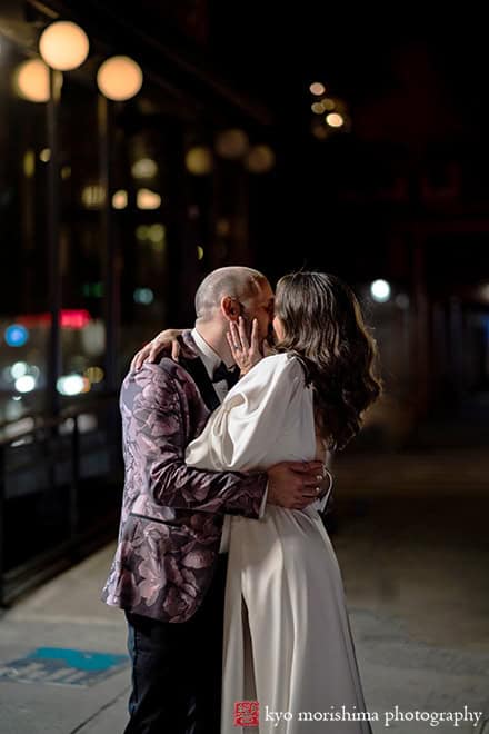 bride and groom outdoor street fun romantic night portrait wedding Chelsea Manhattan NYC kiss