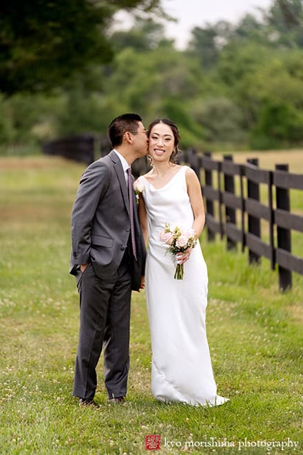 Spring, Princeton, NJ, wedding, St. Charles, Skillman Park bride and groom portrait newlyweds kiss