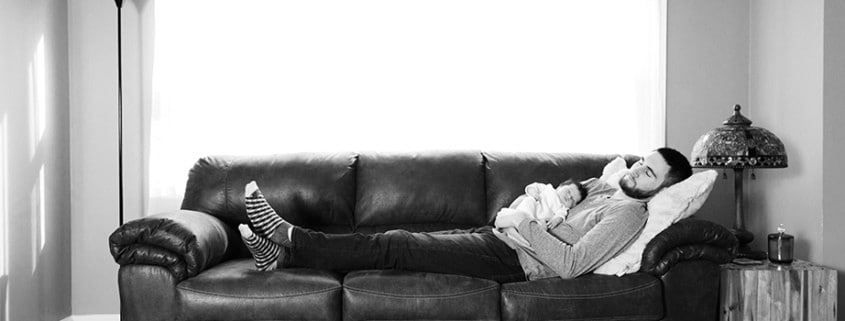 NYC Brooklyn NJ Princeton newborn family portrait dad baby sleeping napping on couch black and white