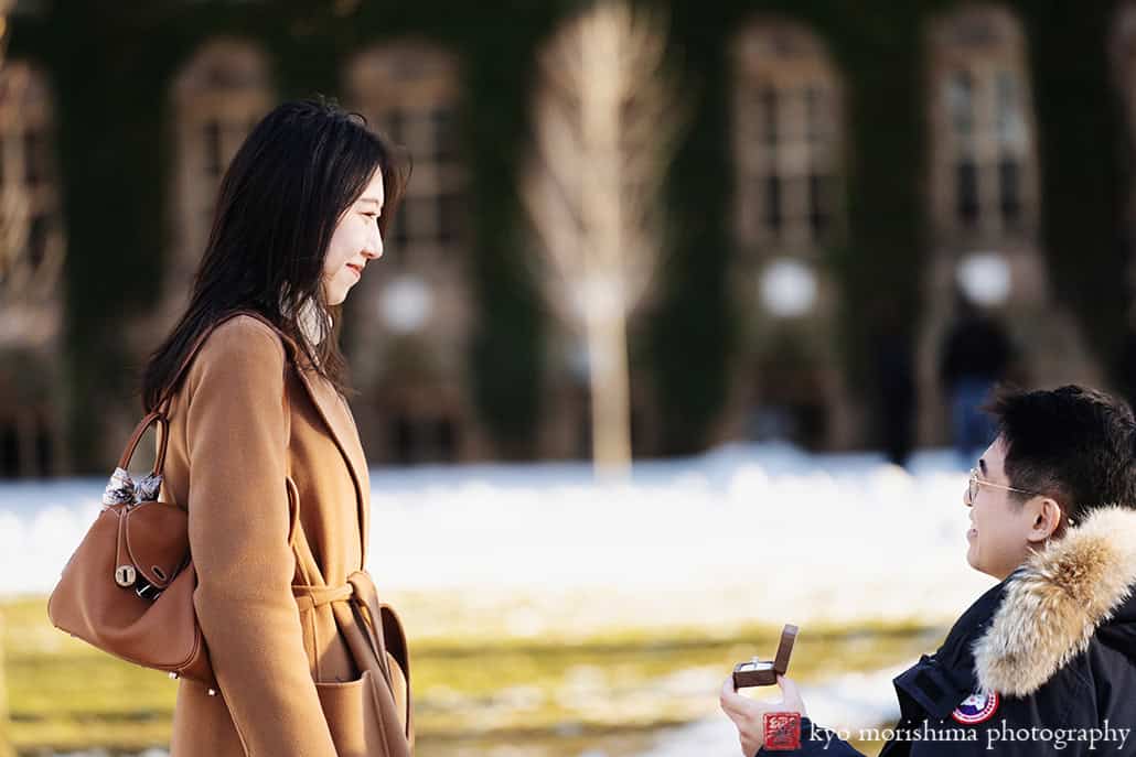 winter snow proposal portrait Princeton University NJ NYC couple on his knee