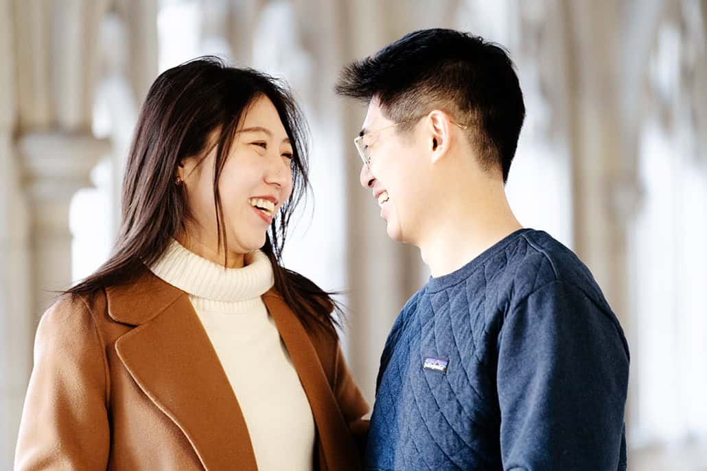 winter snow proposal portrait Rockefeller College Holder Hall Princeton University NJ NYC couple laughing