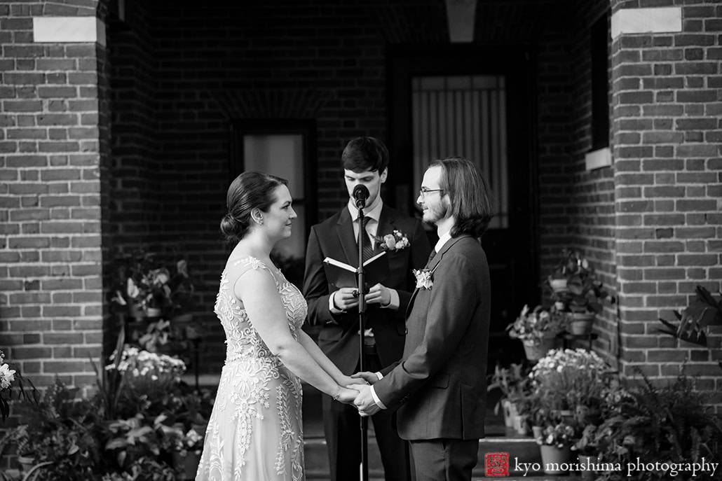 Spring Morris Museum Wedding Potted Plants Morristown NJ bride groom outdoor ceremony holding hands bw black and white