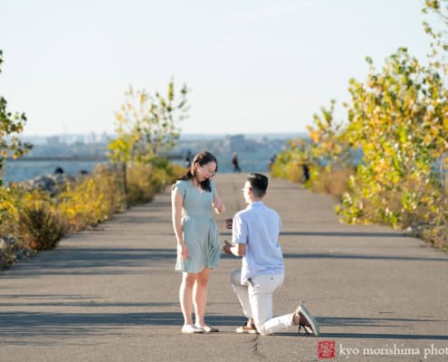 Scavenger Hunt Proposal Portrait Session Bush Terminal Piers Park in Brooklyn, NYC on his knee