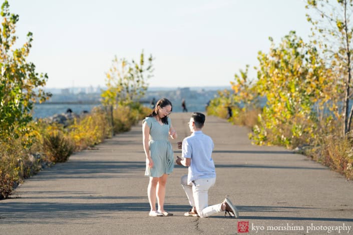 Scavenger Hunt Proposal Portrait Session Bush Terminal Piers Park in Brooklyn, NYC on his knee