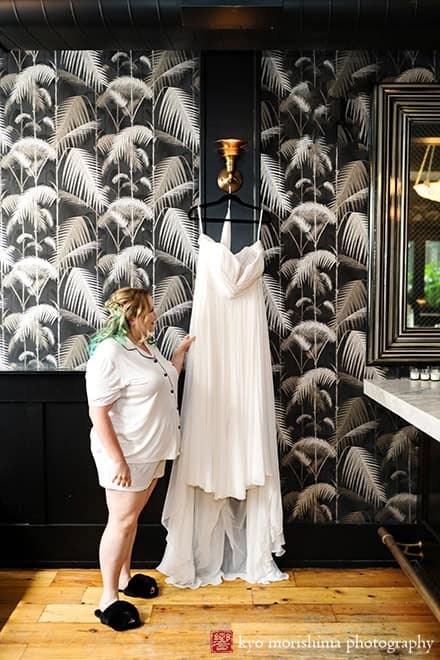 501 Union Brooklyn NYC wedding getting ready bride looking at her beautiful dress