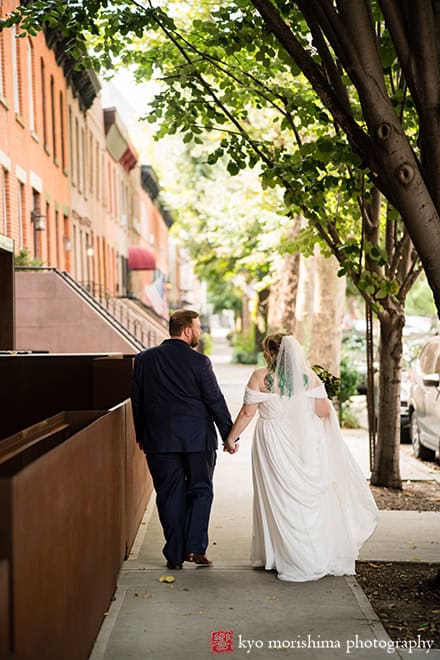 501 Union Gowanus canal Brooklyn documentary street life style wedding portrait newlywed holding hands walking