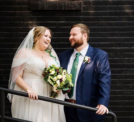 501 Union Gowanus canal Brooklyn documentary street life style wedding portrait bride and groom together smiling