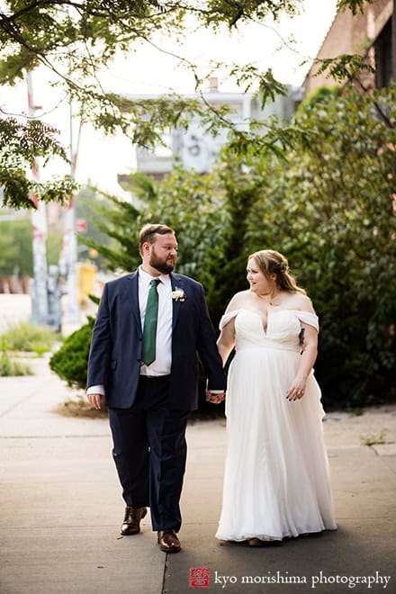 501 Union Gowanus canal Brooklyn documentary street life style wedding portrait bride and groom holding hands walking