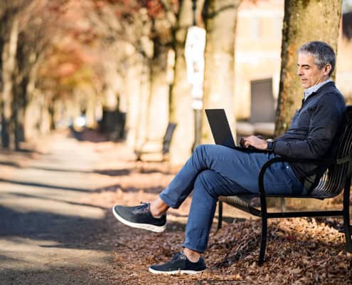 branding entrepreneur portrait business owner, self employed solopreneurs Brooklyn NYC Manhattan Princeton NJ portrait with laptop outside