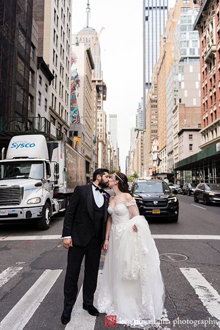 Bride and groom outdoor street portrait Midtown Loft & Terrac, Manhattan NYC rooftop wedding kiss