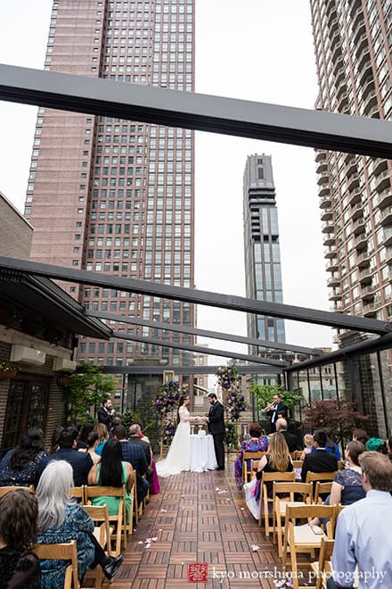 Bride and groom Outdoor ceremony Midtown Loft & Terrac, Manhattan NYC rooftop wedding