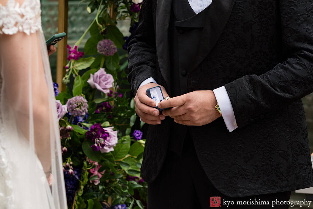 Bride and groom Outdoor ceremony Midtown Loft & Terrace, Manhattan NYC rooftop wedding exchanging rings