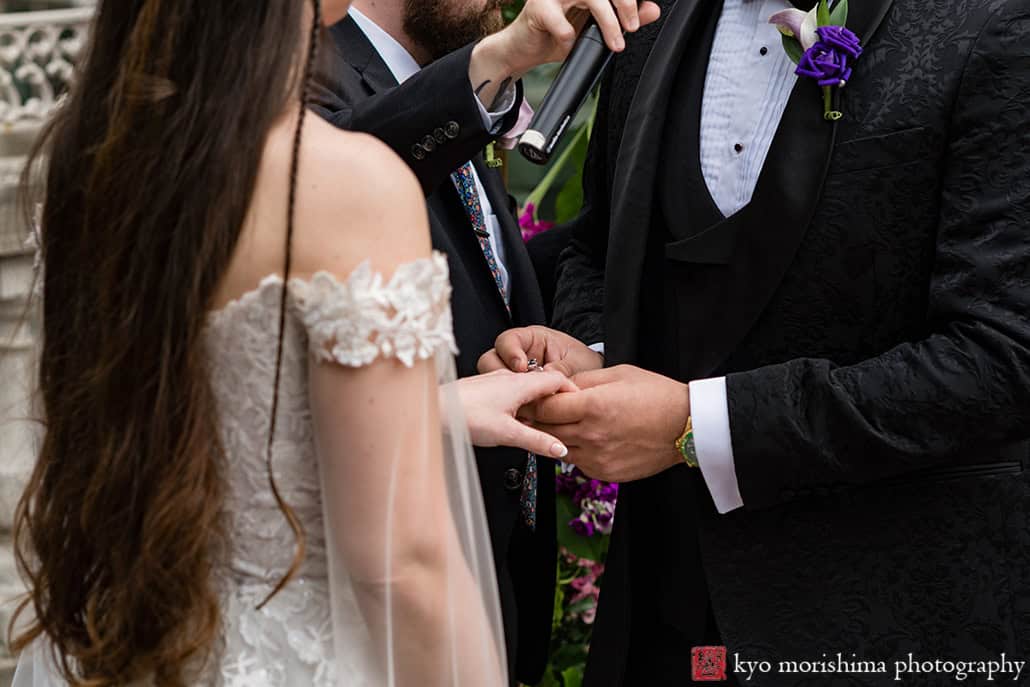 Bride and groom Outdoor ceremony Midtown Loft & Terrace, Manhattan NYC rooftop wedding exchanging rings