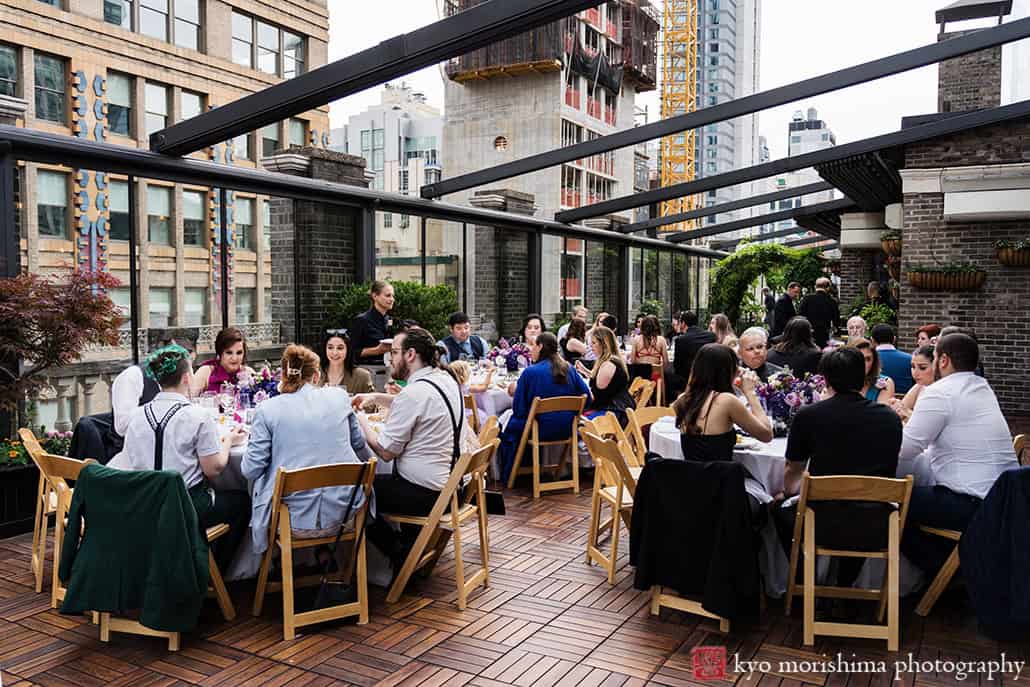 Bride and groom Outdoor reception Midtown Loft & Terrace, Manhattan NYC rooftop wedding