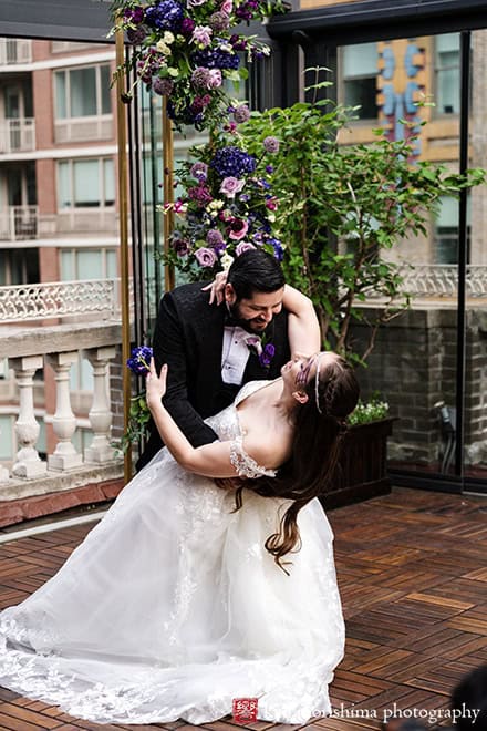 Bride and groom first dance dip finish Outdoor reception Midtown Loft & Terrace, Manhattan NYC rooftop wedding