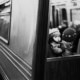 Baby on Parent’s Back in the NYC Subway