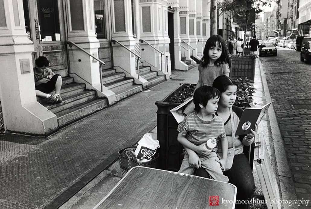 street photography decisive moment, black and white, film, kids on sidewalk in soho nyc