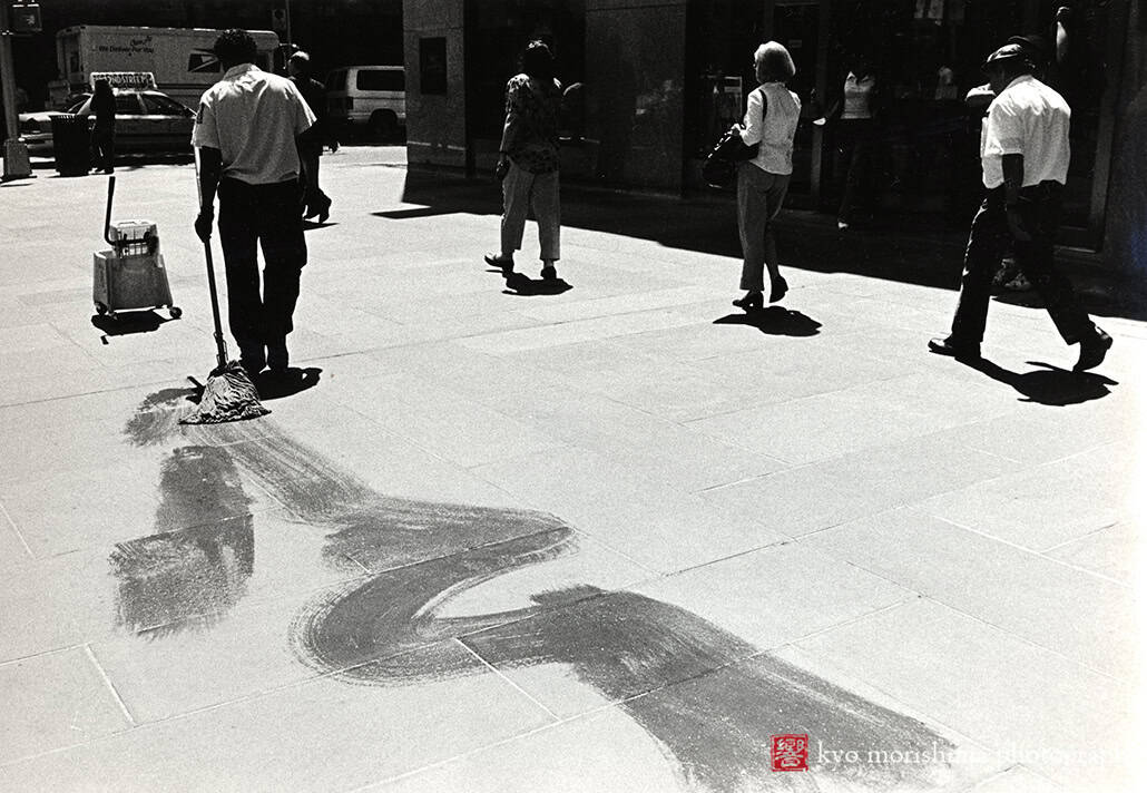 Mop at Rockefeller Plaza, Midtown NYC black and white film street photography