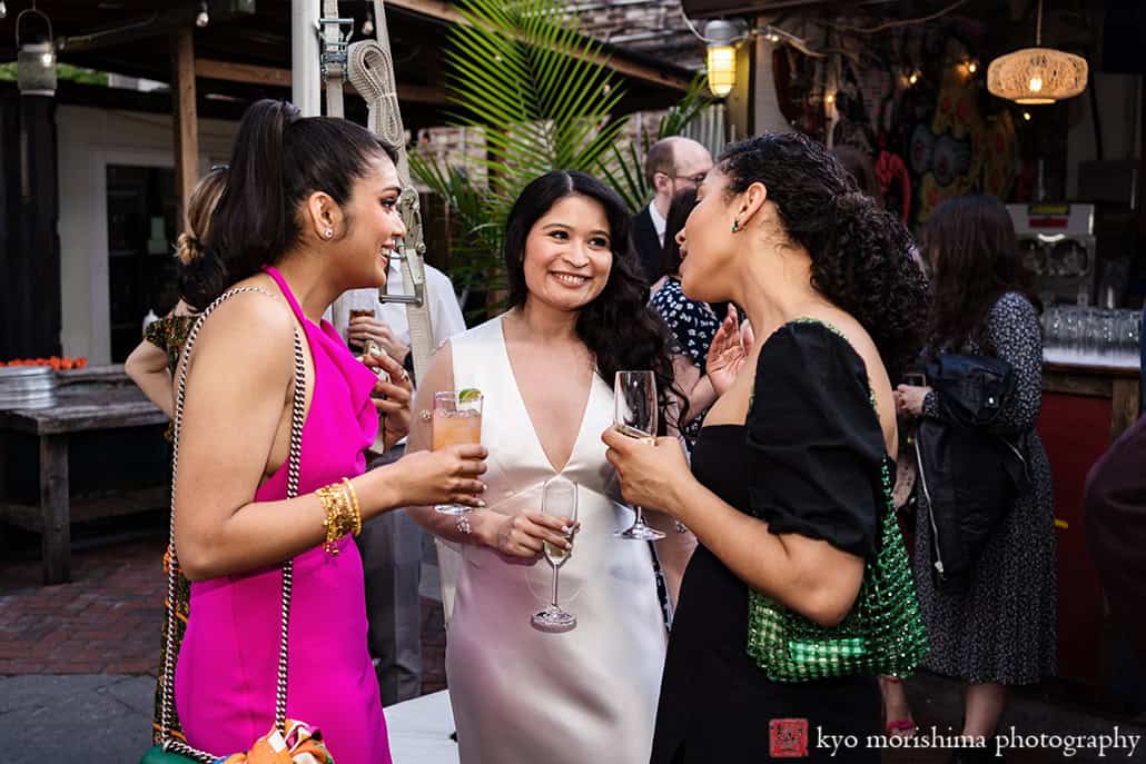 Roberta's Pizza, Brooklyn, Bushwick, NYC restaurant backyard wedding cocktail hour, Kyo guests congratulating fun