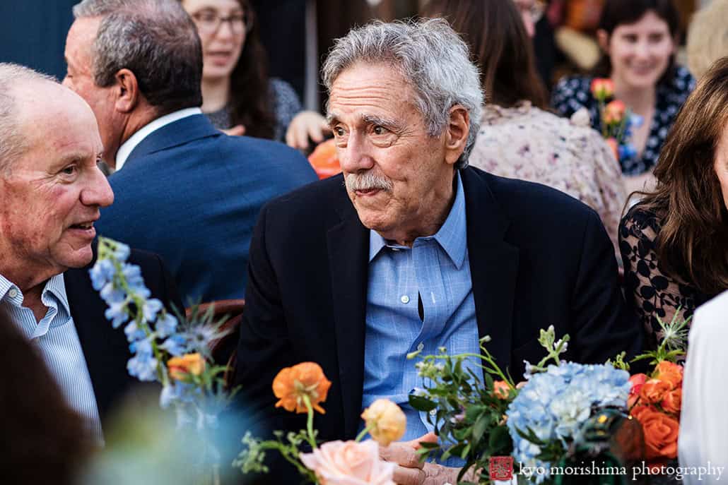 Roberta's Pizza, Brooklyn, Bushwick, NYC restaurant backyard wedding reception Kyo guests having fun smiling at table