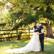 outdoor portrait bride and groom newlyweds kiss tree field, Princeton NJ Updike Farmstead summer fall autumn Wedding