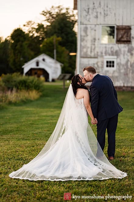 outdoor portrait bride and groom newlyweds kiss, windmill field, Princeton NJ Updike Farmstead summer fall autumn Wedding