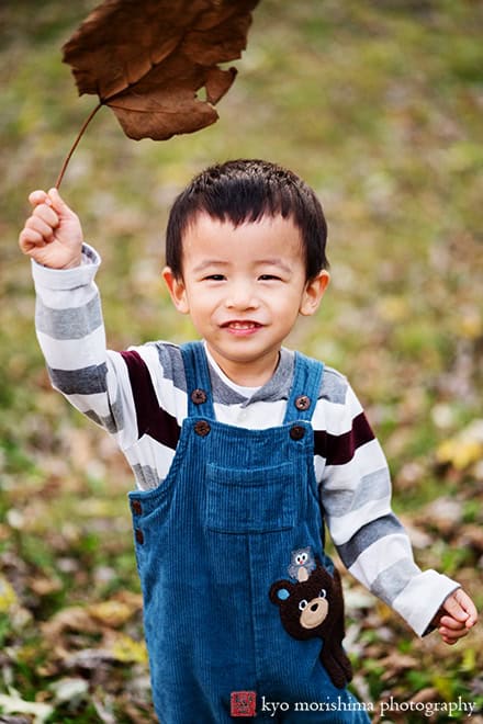 a boy smiling outside d&r park Kingston New Jersey fall Princeton family photo