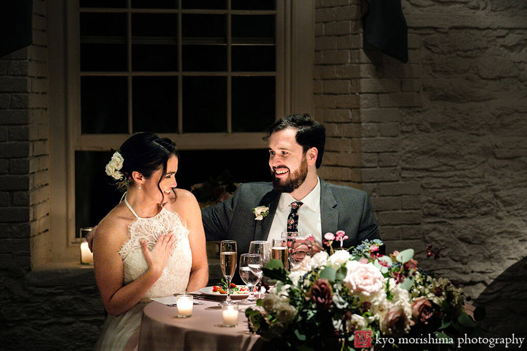 Stone Mill, NYBG, NYC, New York Botanical Garden, fall bride and groom wedding reception smiling at each other