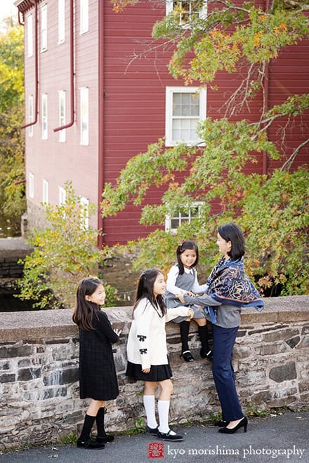 fall daughters and mom relaxing d&r park Kingston New Jersey family photo
