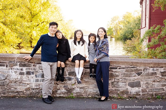 fall daughters and parents smiling and posing d&r park Kingston New Jersey family photo