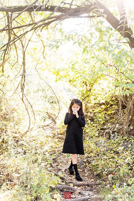 a girl walking down on a trail d&r park Kingston New Jersey family candid photo