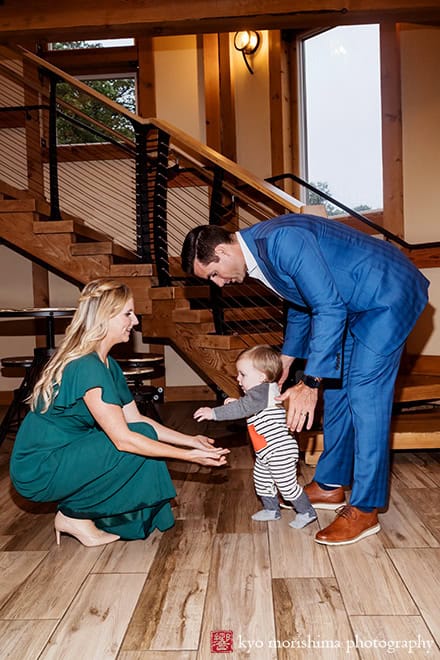 Rock Island Lake Club NJ Wedding reception guests with a baby