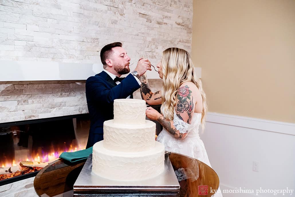 Rock Island Lake Club NJ Wedding reception cake cut feeding