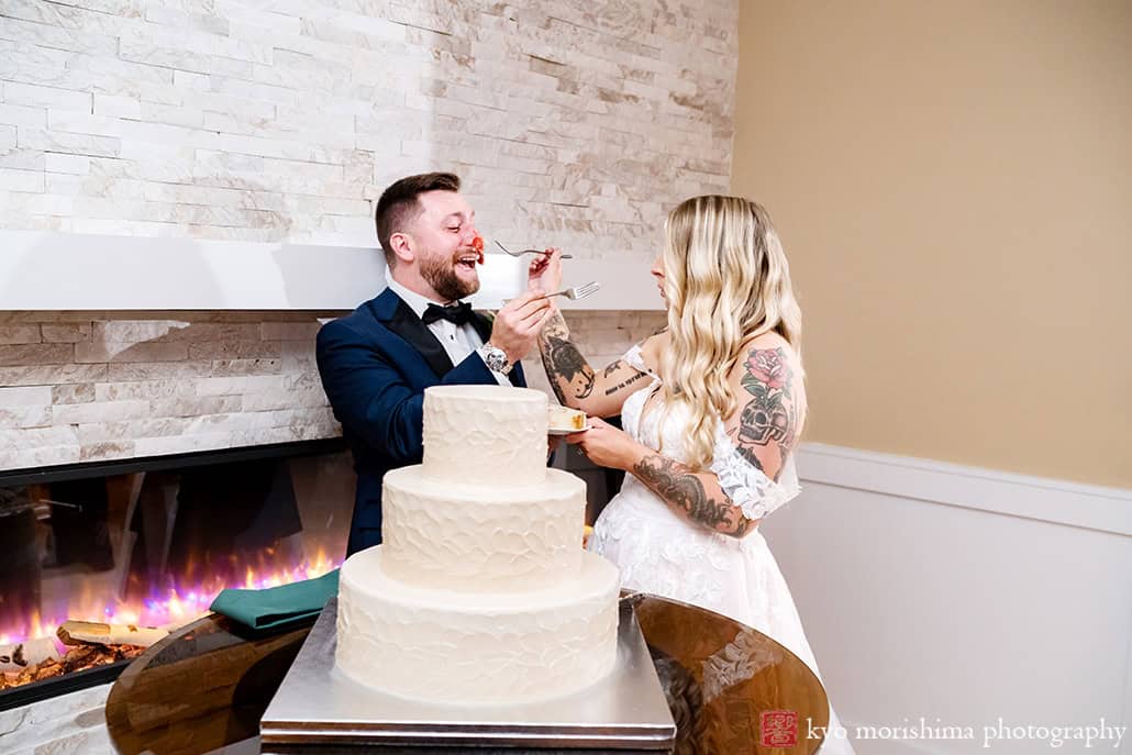 Rock Island Lake Club NJ Wedding reception cake cut feeding