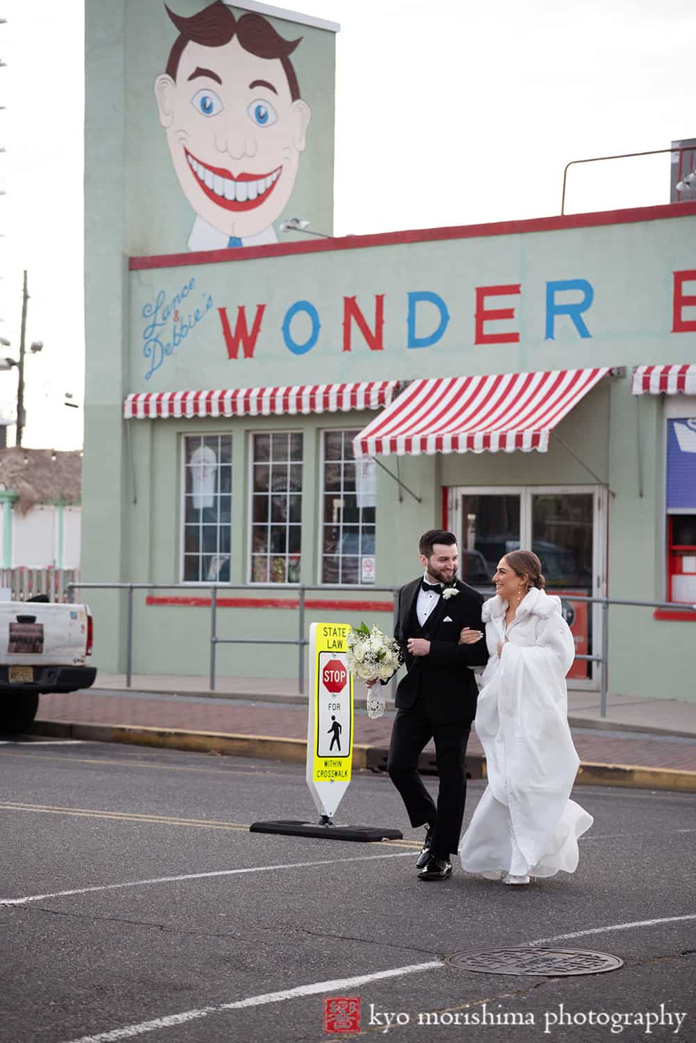 Asbury Hotel, NJ, Asbury Park, winter wedding bride and groom outdoor portrait smiling Wonder Bar