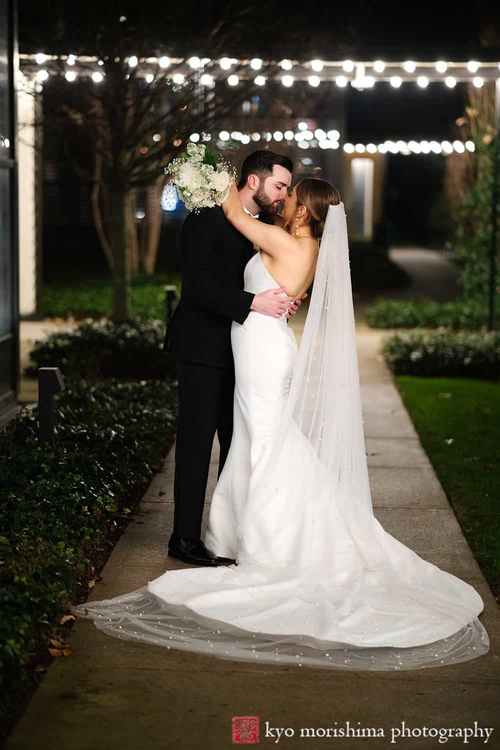 Asbury Hotel, NJ, Asbury Park, winter wedding bride and groom outdoor night portrait kiss