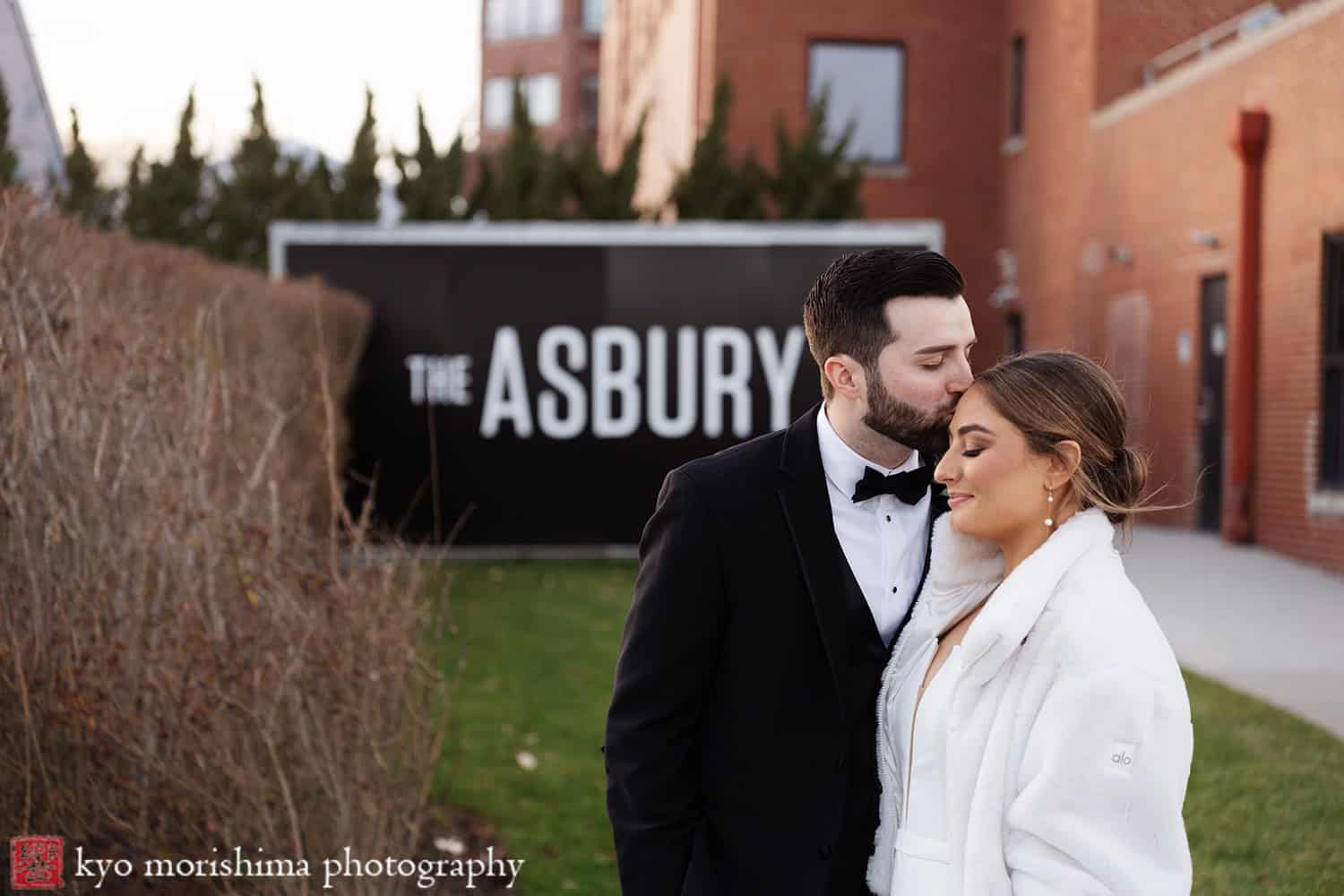 Asbury Hotel, NJ, Asbury Park, winter wedding bride and groom outdoor portrait kiss