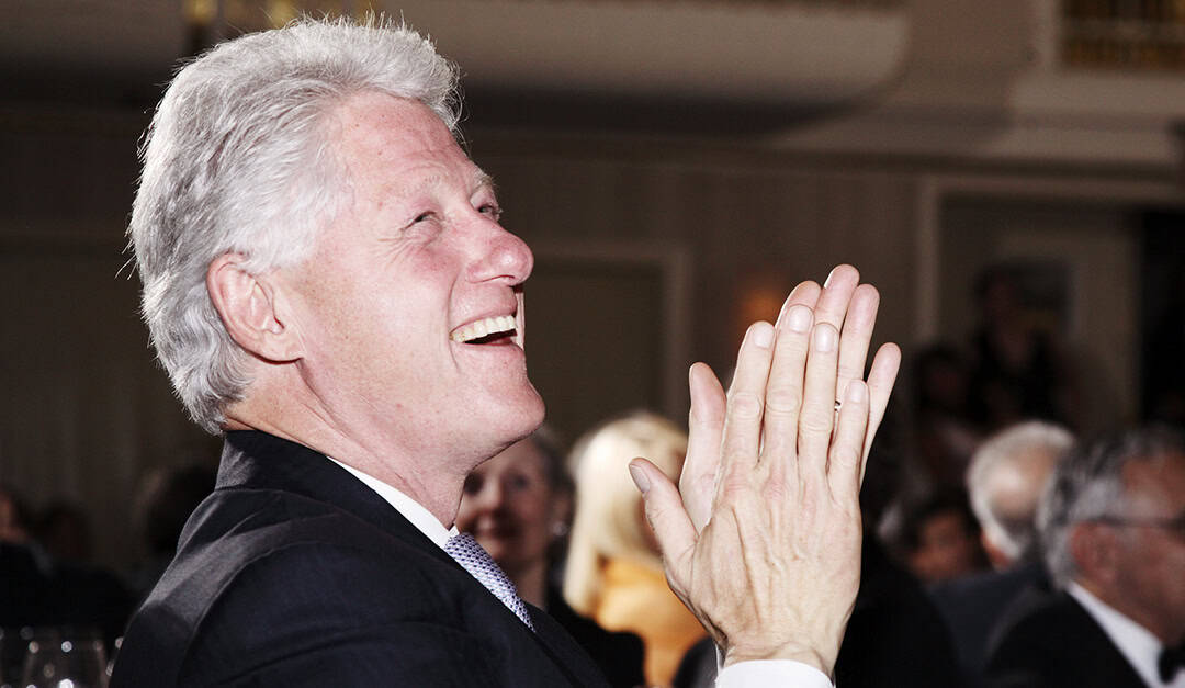 Bill Clinton President hands clapping United Nation VIP Gala, Waldorf Astoria, New York City, corporate event