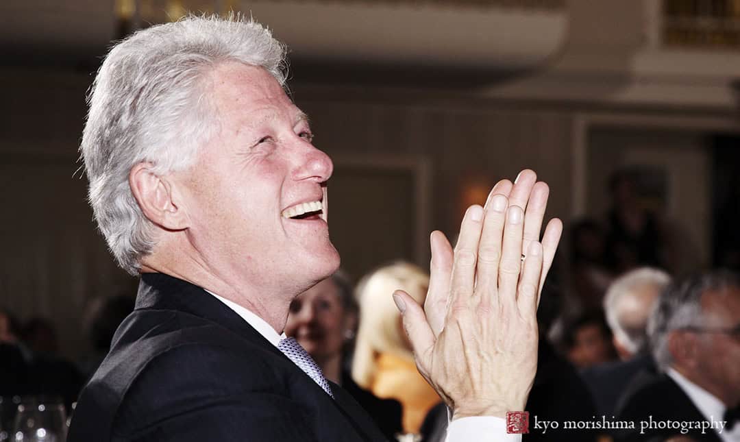 Bill Clinton President hands clapping United Nation VIP Gala, Waldorf Astoria, New York City, corporate event