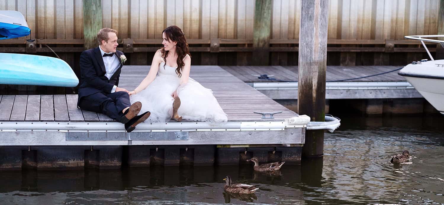 Molly Pitcher Inn Red Bank Brooklyn NYC bride and groom bay ocean wedding portrait smile on dock ducks