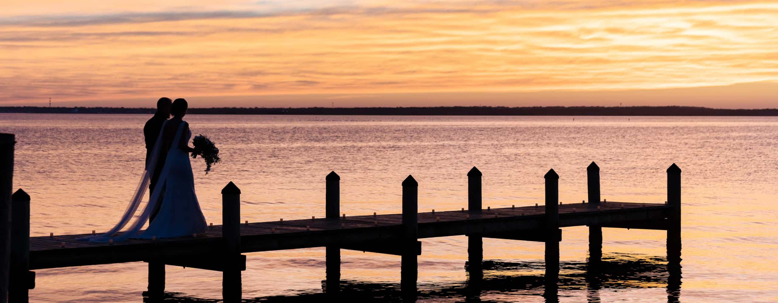 Lavallette Ocean Beach & Yacht Club Toms River beach wedding sunset silhouette bride and groom newlyweds portrait on dock