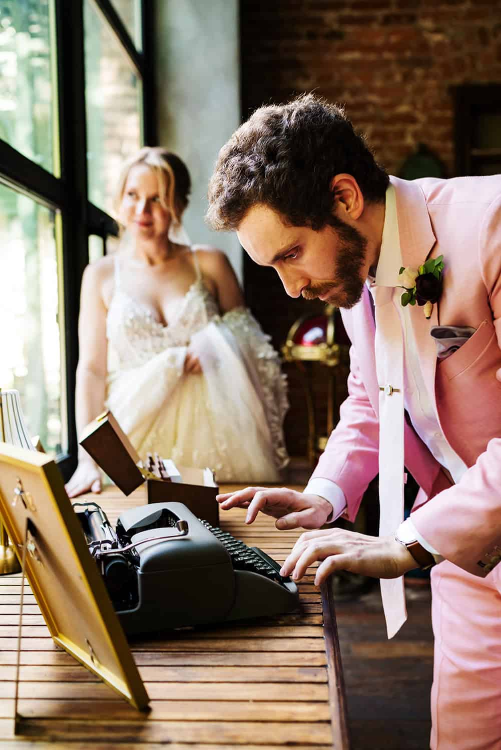 Reception bride and groom relaxing and typing wedding outdoor Milk and Roses backyard Greenpint Brooklyn NYC Wedding
